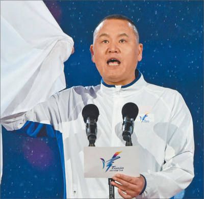金牌教练徐国义一池水一辈子 让游泳挺起腰杆
